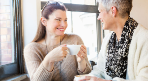 How to combat loneliness: two women talking with a cup of tea